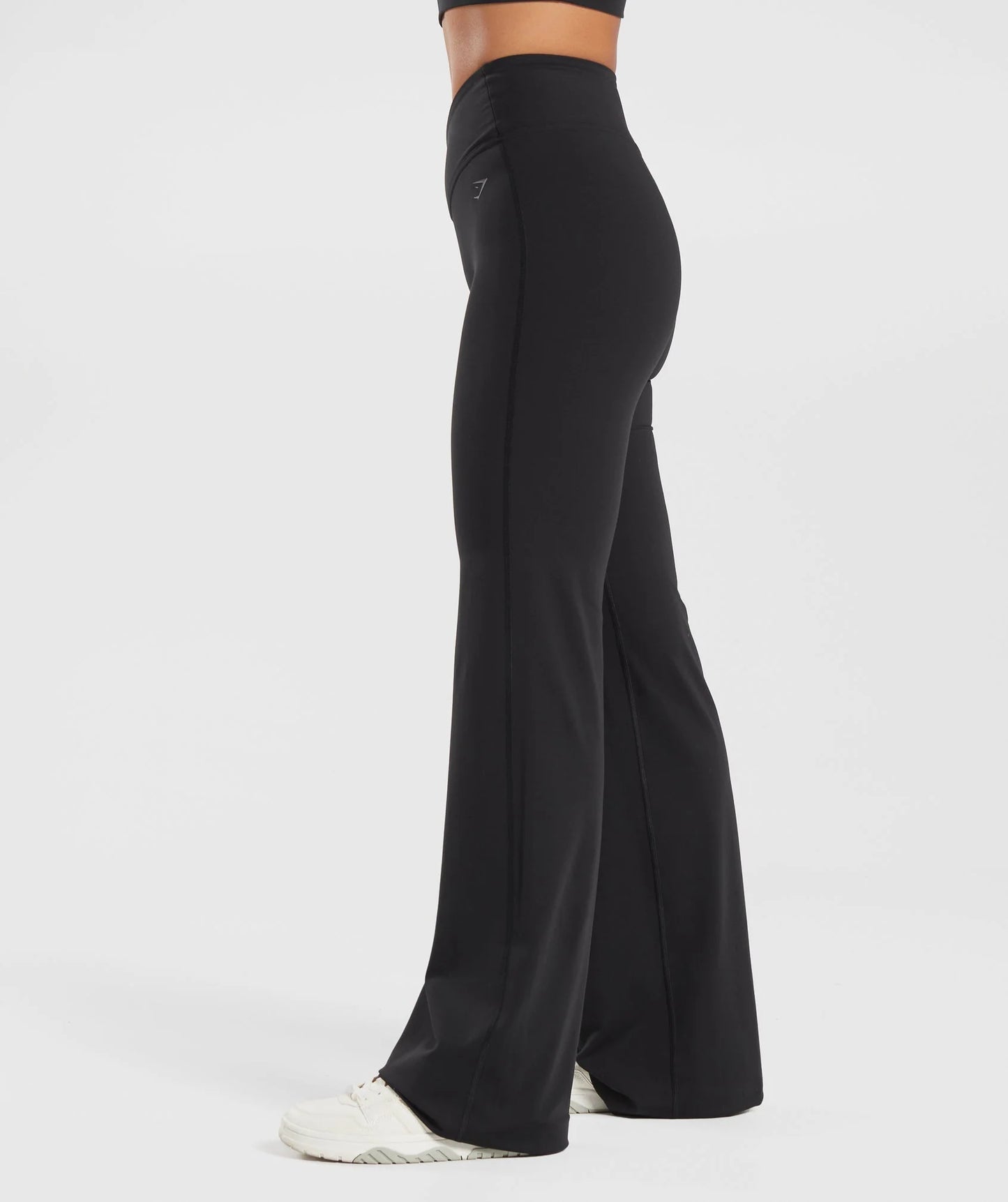 Crossover flared legingi